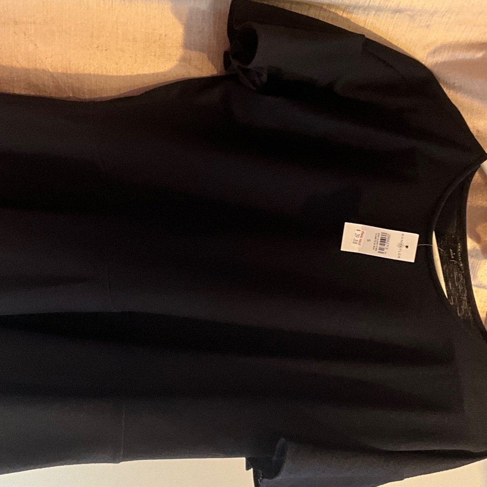 Navy shear blouse, with ruffled sleeves